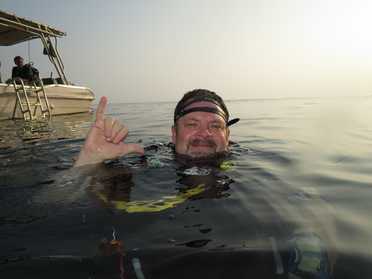 Darrell Seale surfacing from a dive in Musandam, Oman